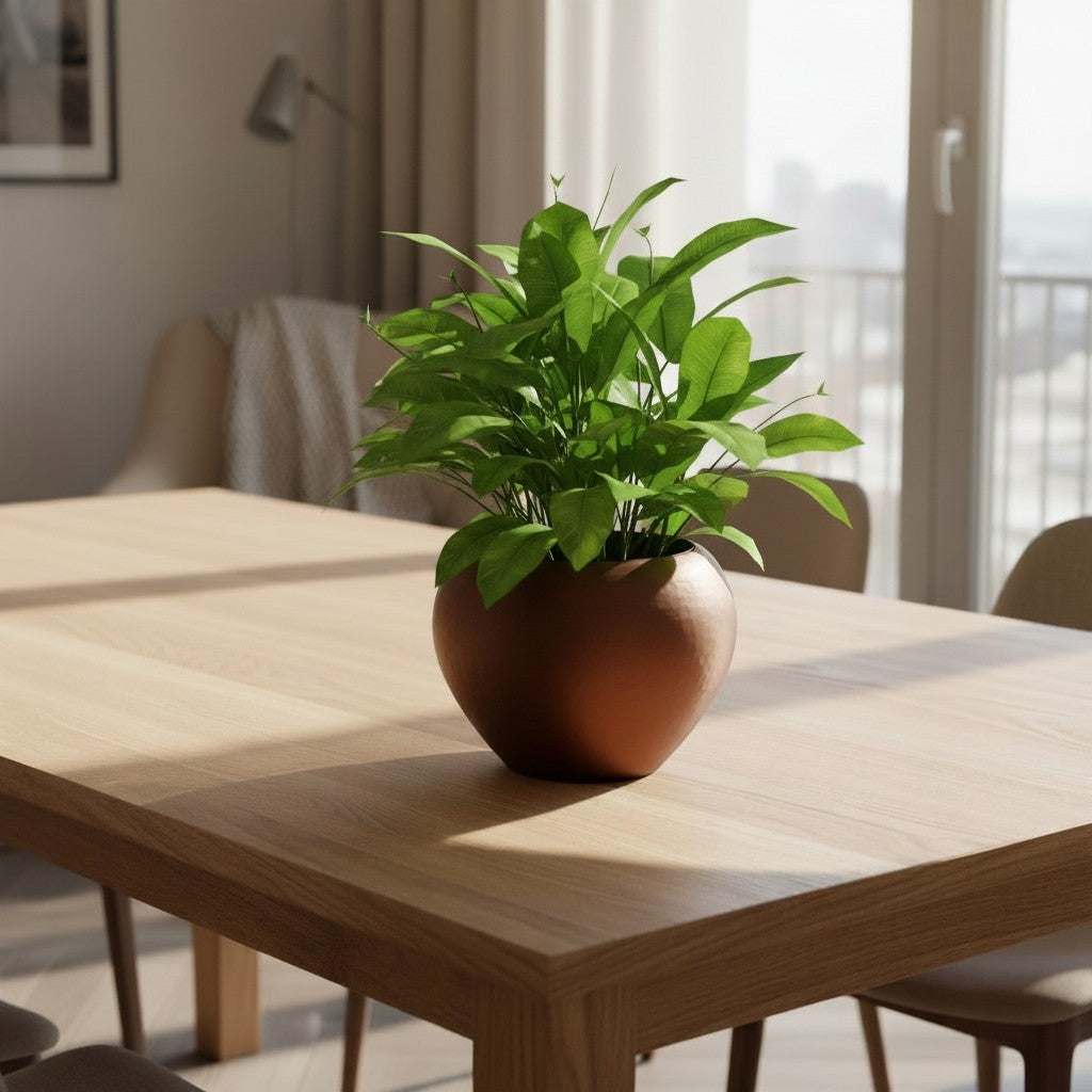 Self-watering plant pot in a hammered design