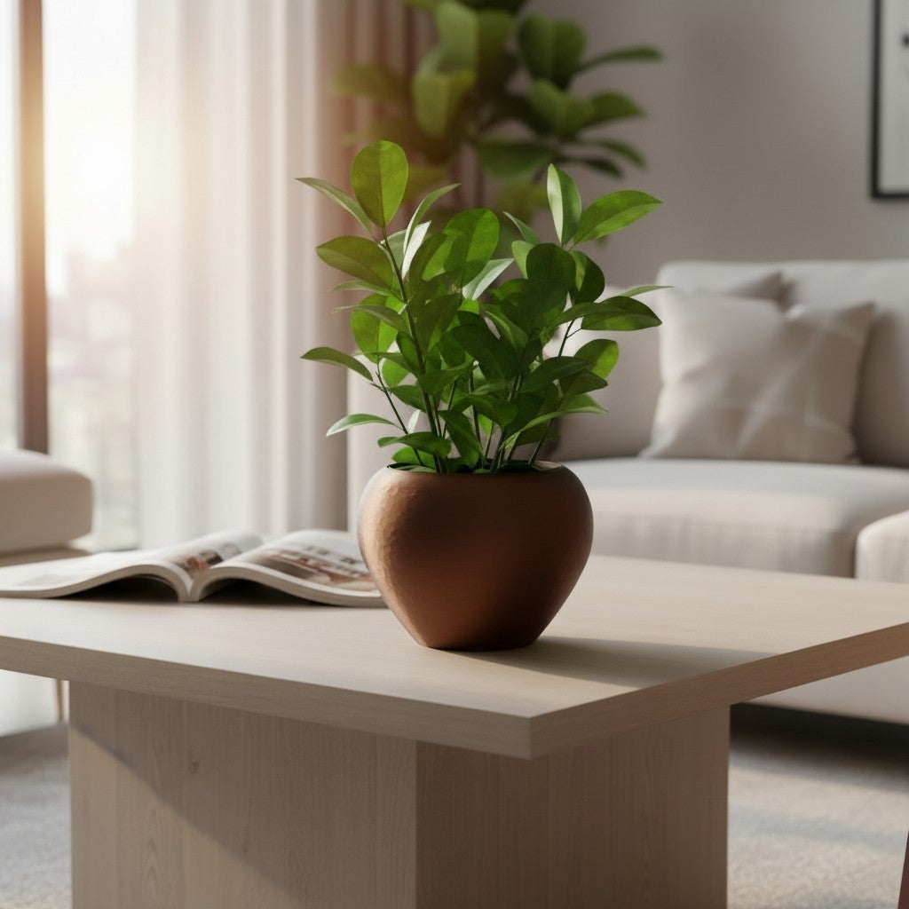 Self-watering plant pot in a hammered design