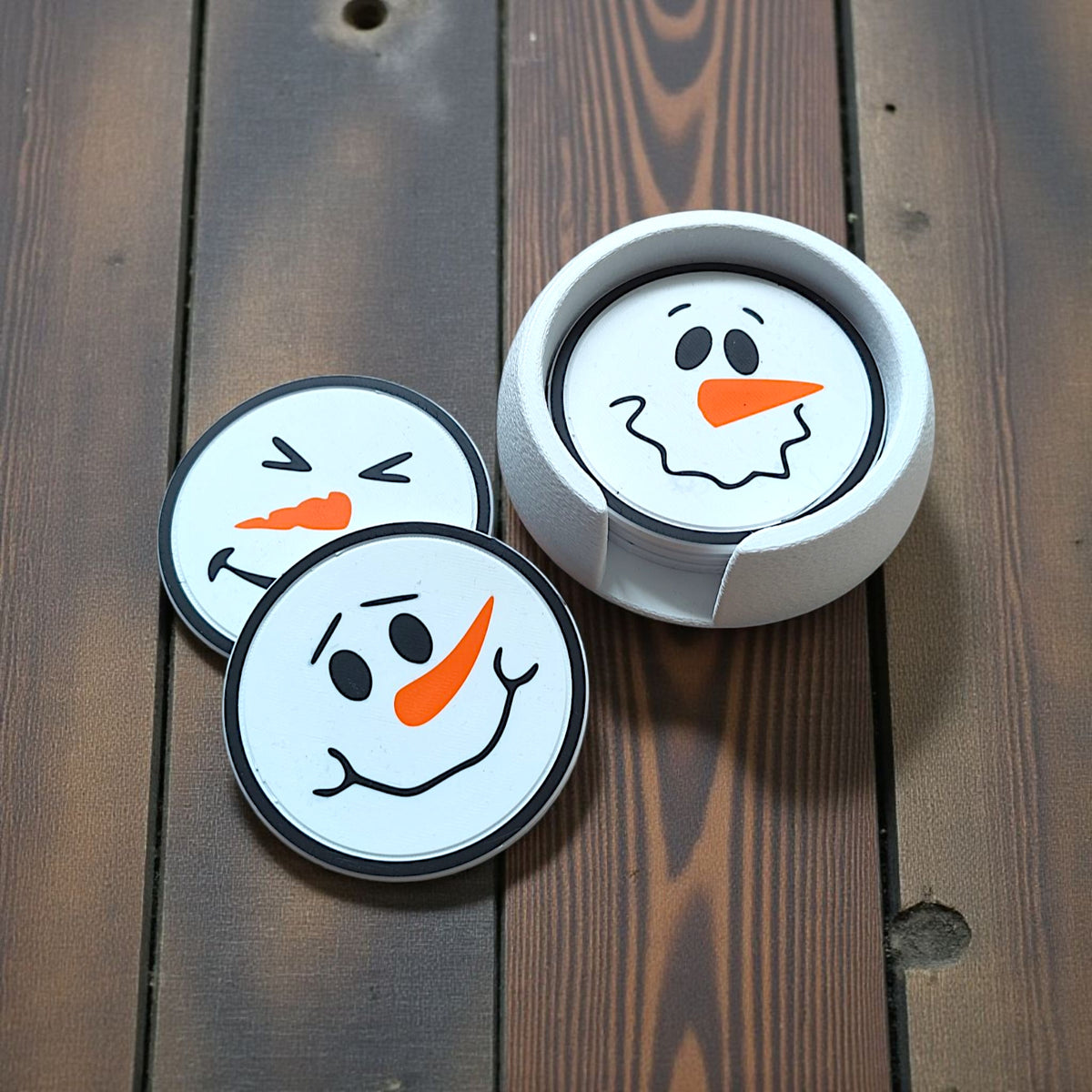 Snowman coasters on festive table