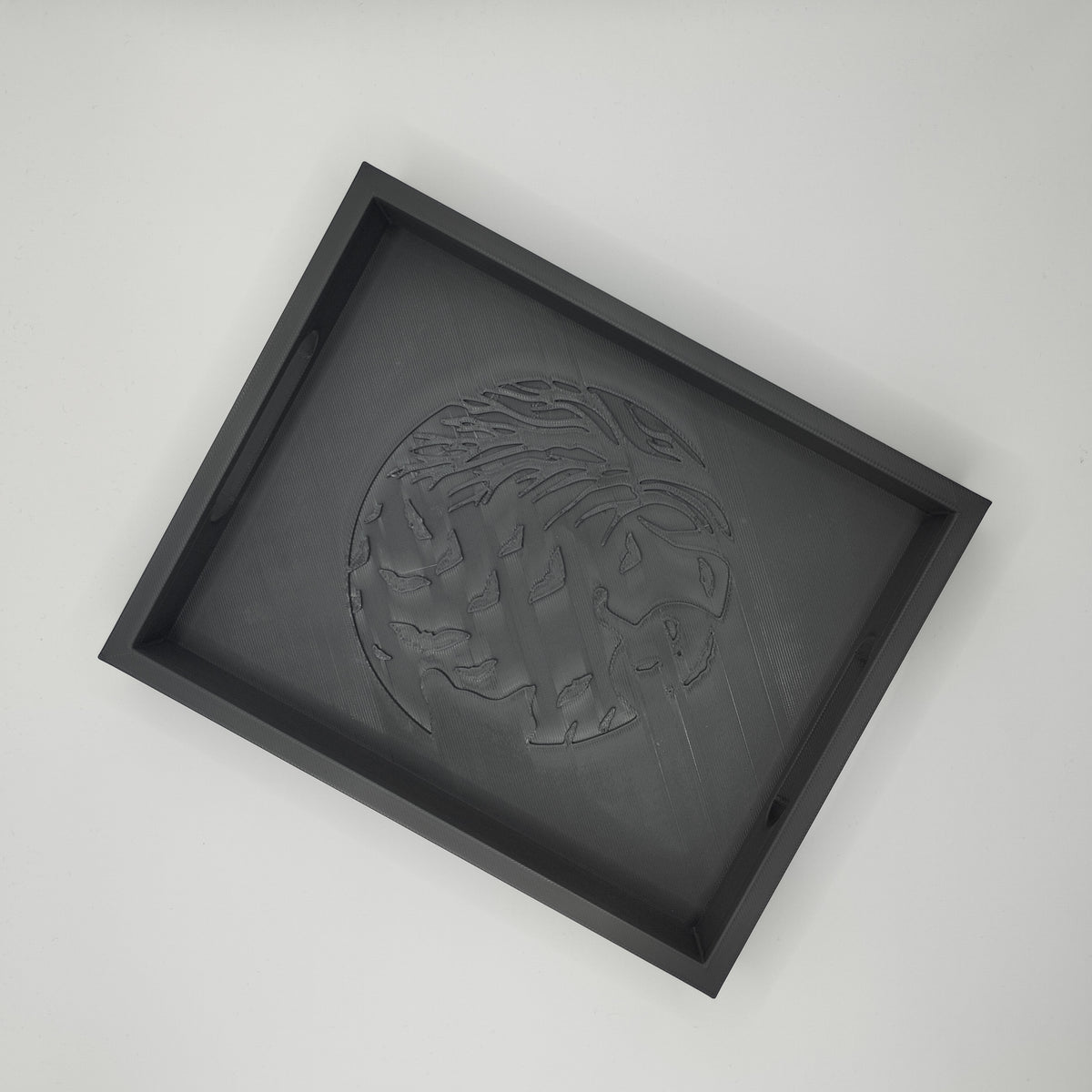Black Halloween tray top down product shot showing embossed moon scene