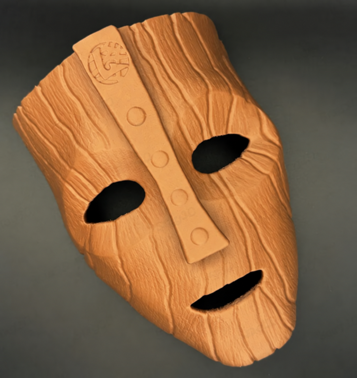 The Mask - Mask in a warm tan wood-look finish