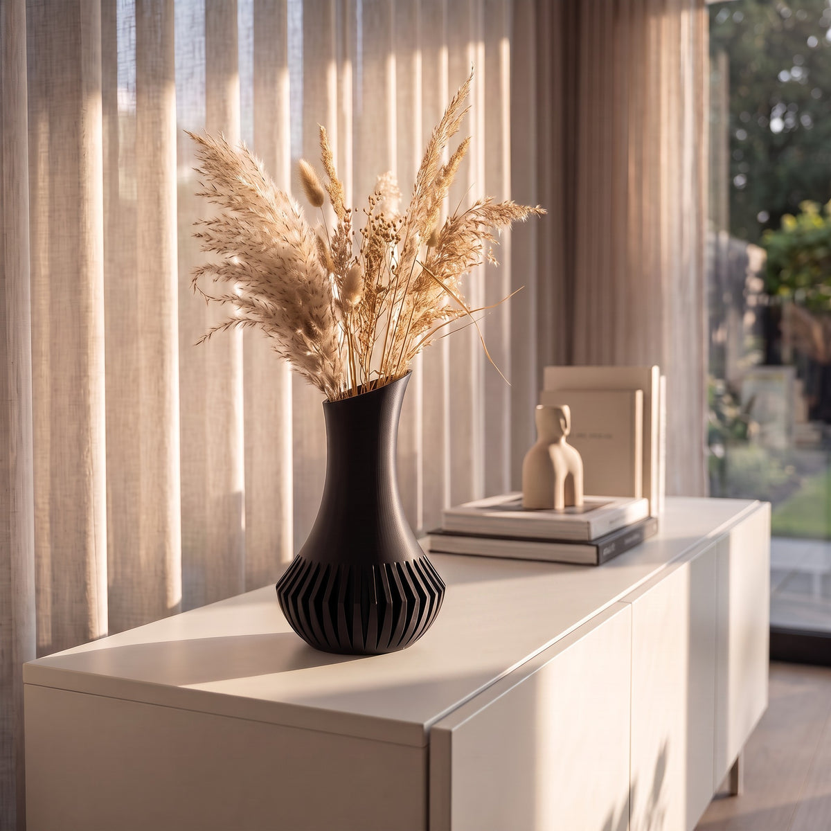 Veluna vase with dried poppy stems on white sideboard