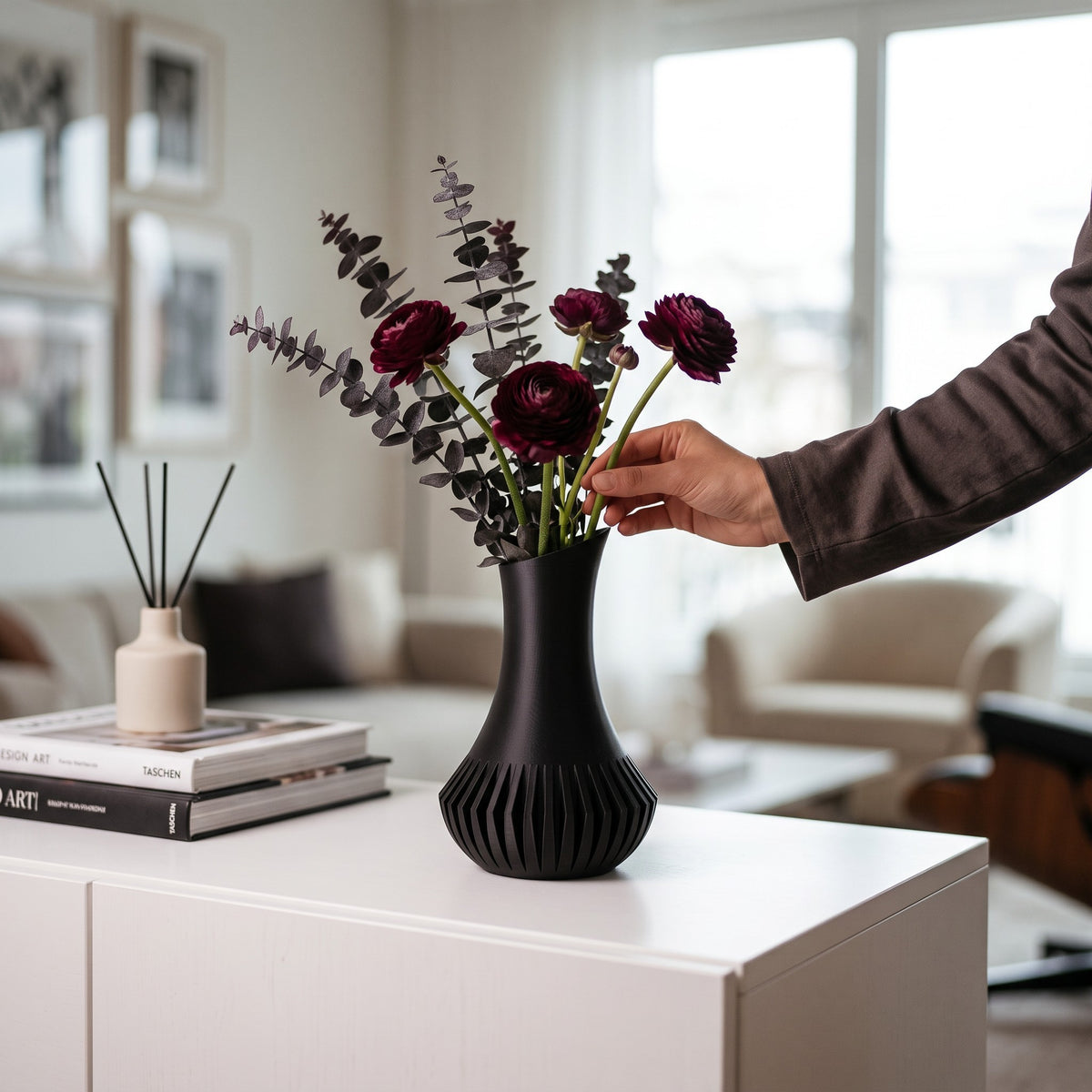Veluna vase with pampas grass on coffee table, bright living room