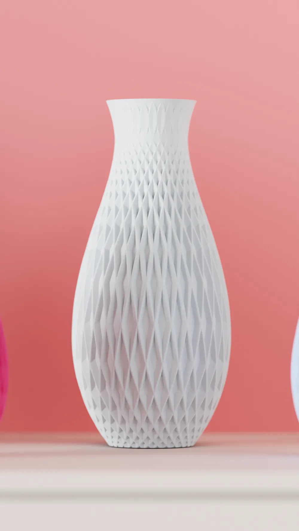 Textured Geometric Vase white diamond-weave lattice teardrop silhouette portrait coral pink background full height