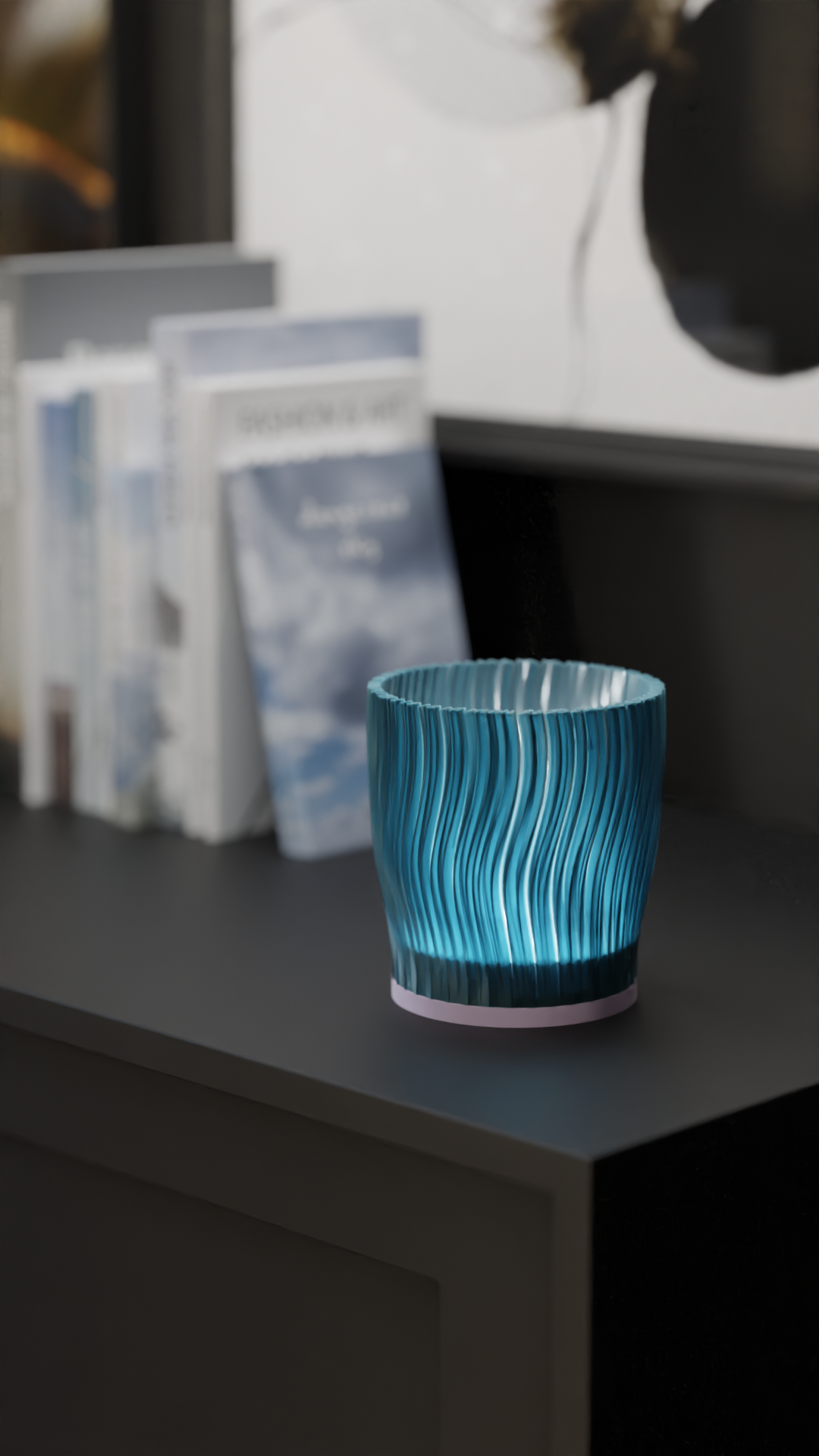 Ripple Edge Tealight Holder translucent teal cylindrical vertical wave-ripple texture glowing warm LED tealight within two hands cradling dark studio dramatic spotlight hero shot