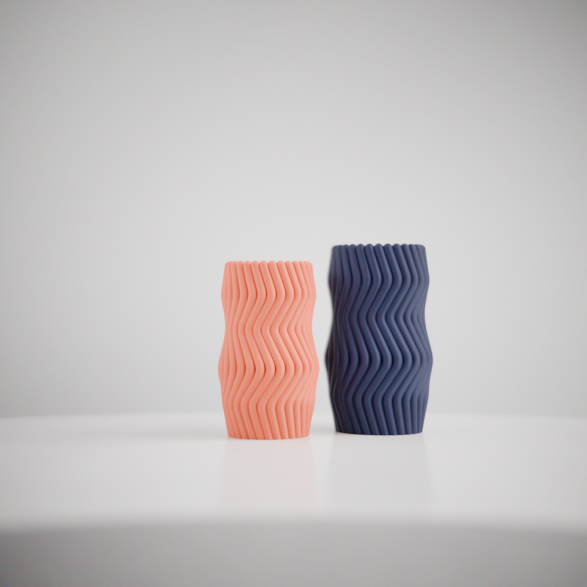 Wavy Twist Vase Set on oak sideboard, monstera plant, beige wall
