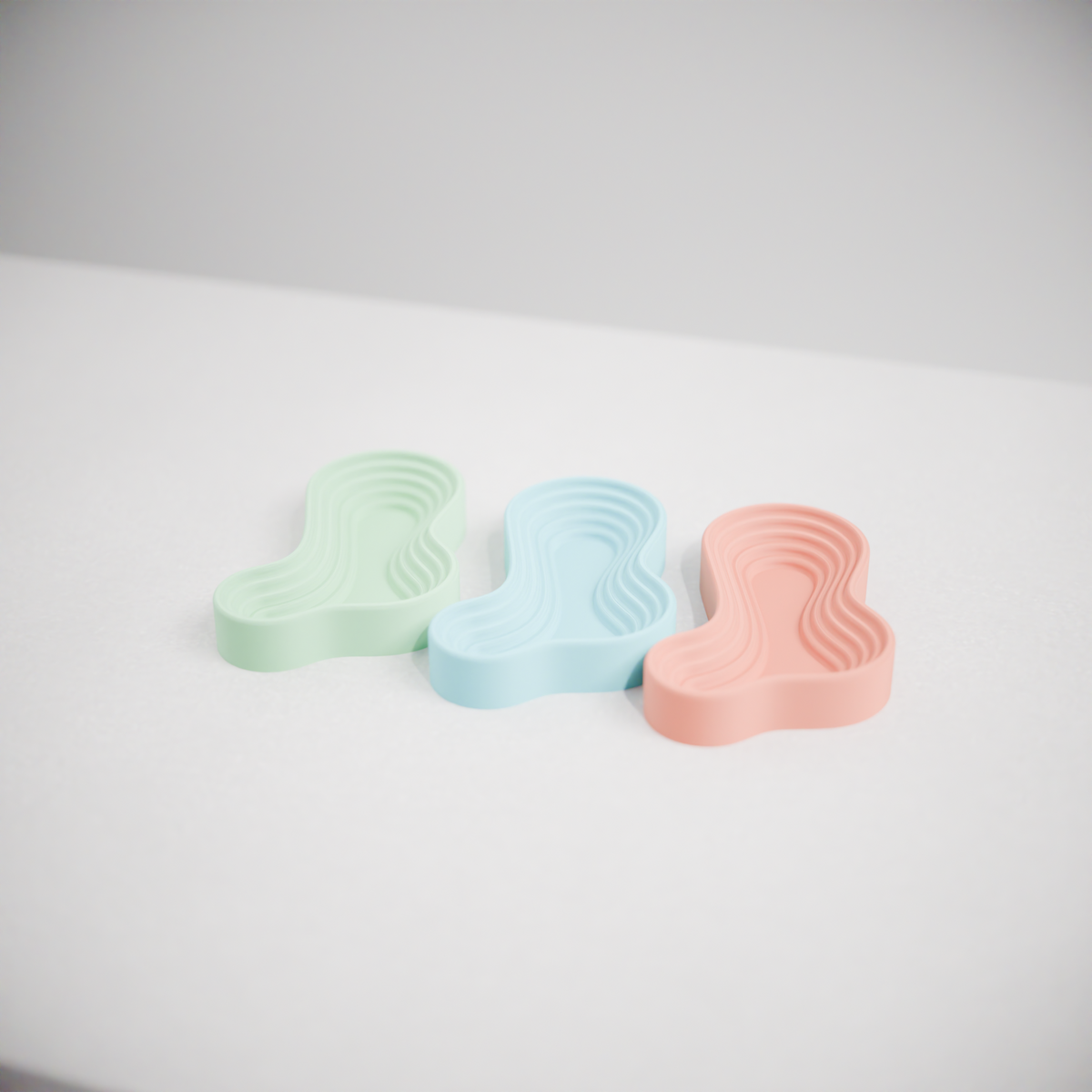 Ripple Tray Organizer Set three quarter angle render white background showing depth and rim profile