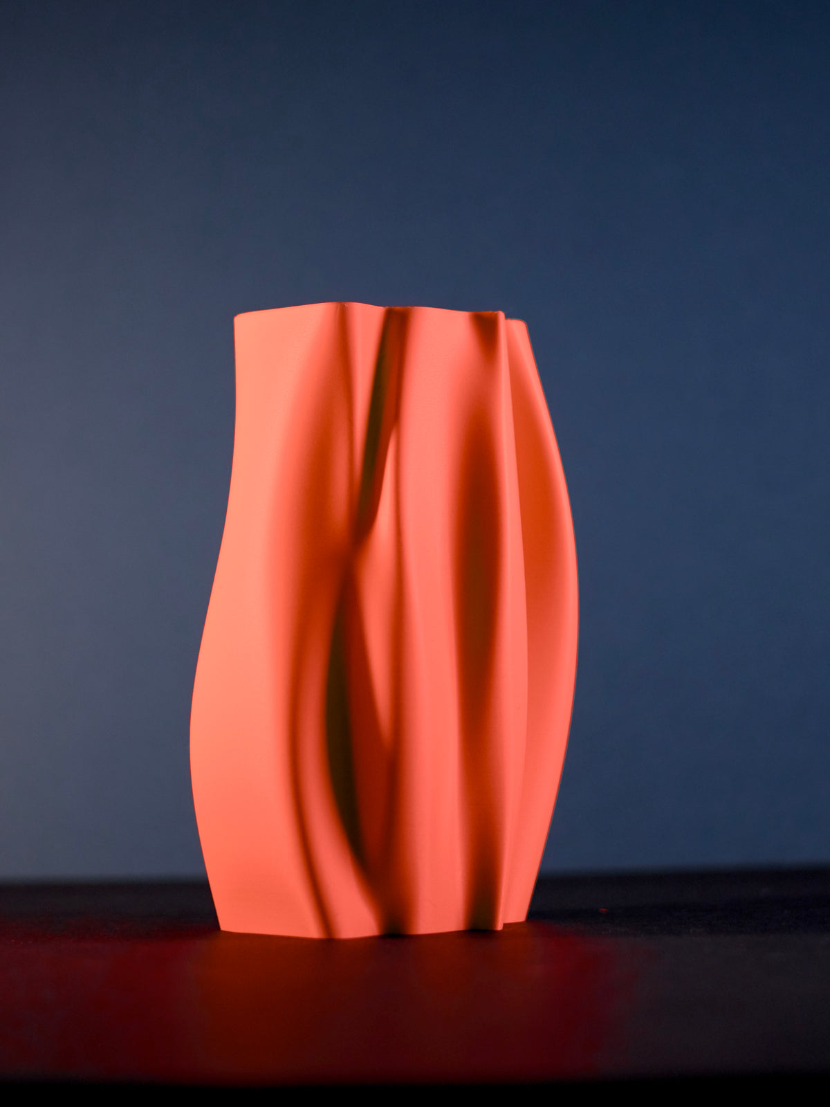 Elegant Organic Flow Vase base render showing smooth flowing sculpted ridge silhouette