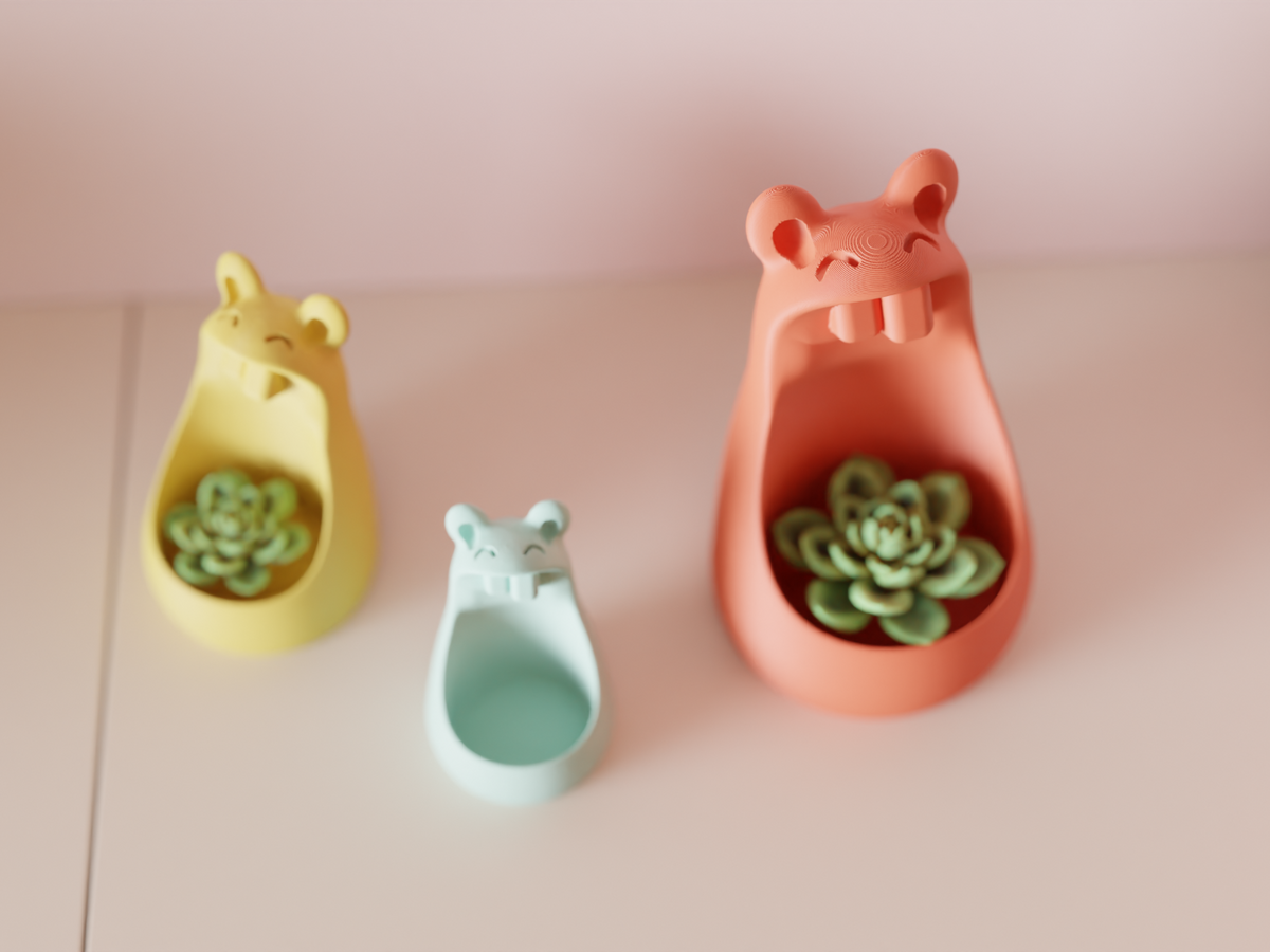Kawaii Mouse Planters in pastel colours holding small succulents