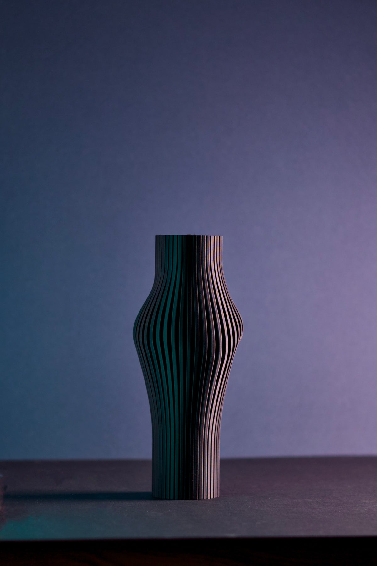 Elegant Sculpted Ribbed Vase matte black render showing curvaceous ribbed silhouette