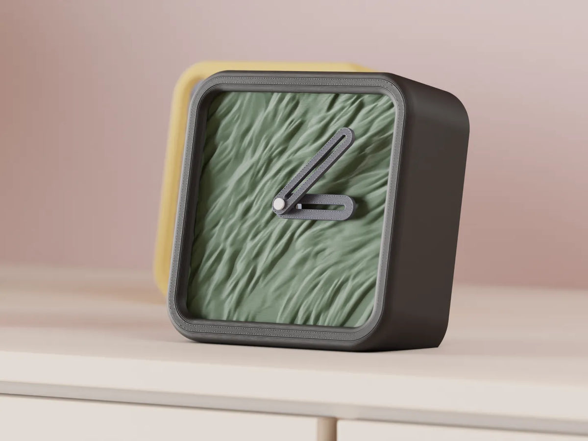 Modern Minimalist Textured Desk Clock Black frame with Green ripple texture face on rustic cork slabs olive tree branches warm terracotta background