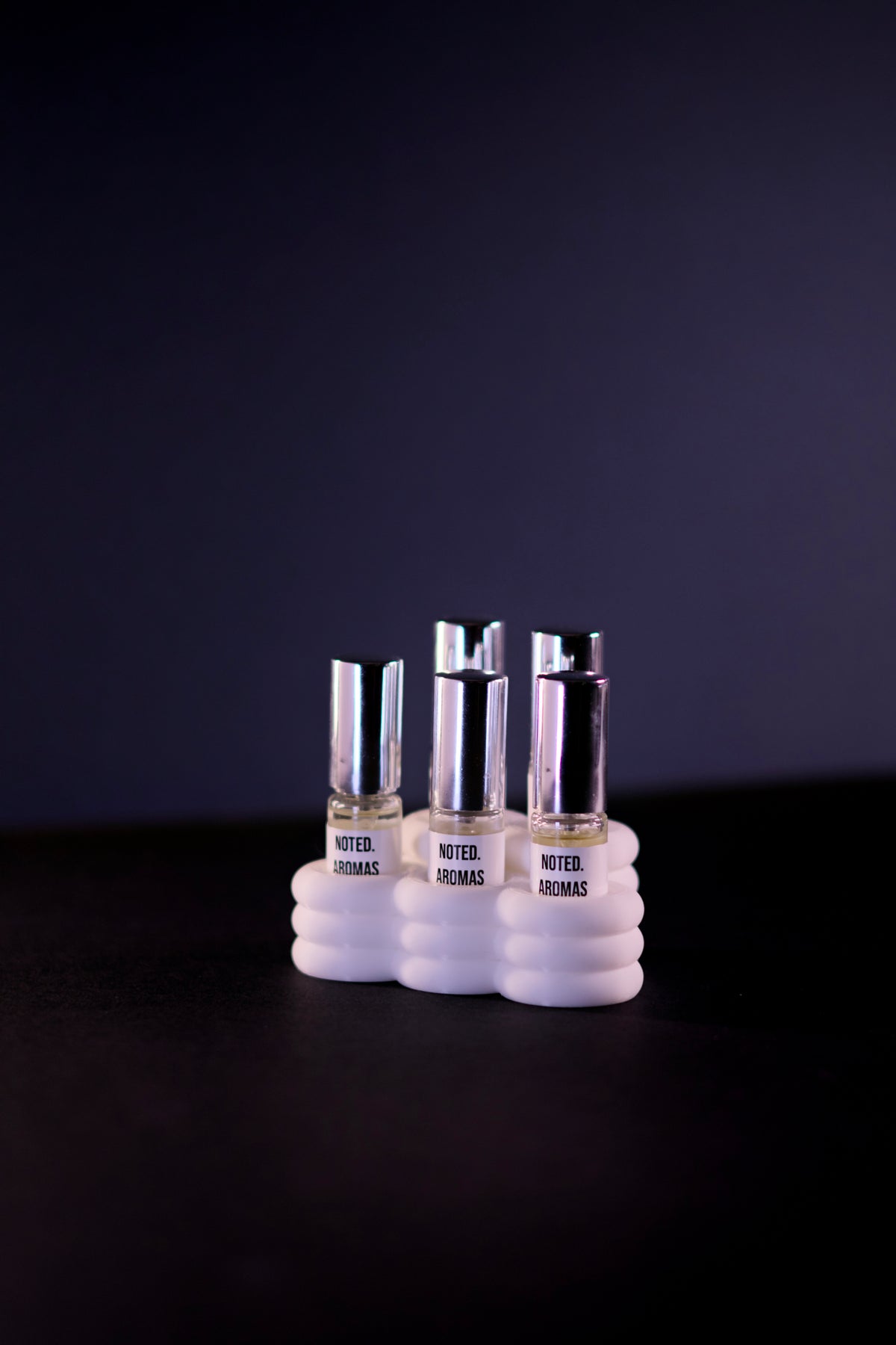 Cloud Perfume Sample Stand base render showing soft bubble cloud silhouette with three vial slots