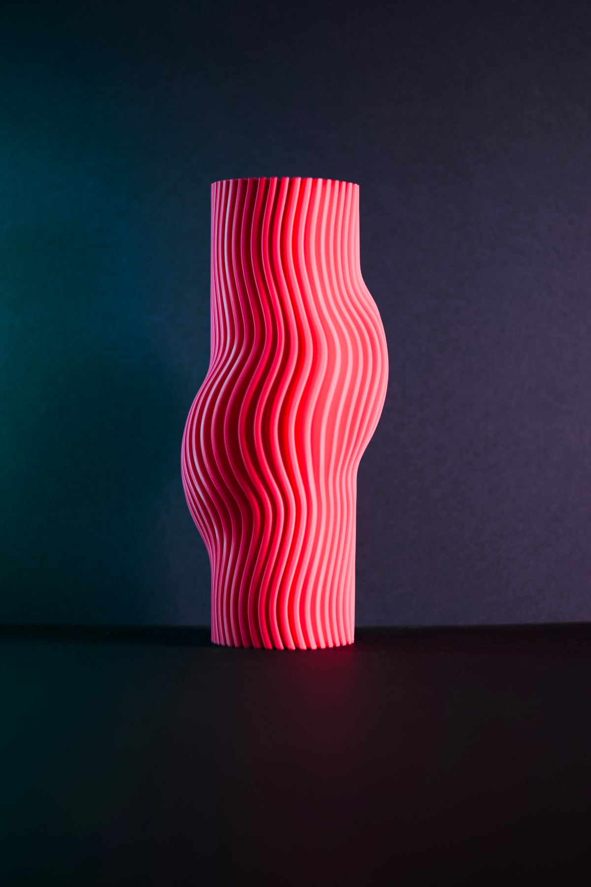 Elegant Ribbed Flow Vase pink render showing ribbed silhouette and organic form