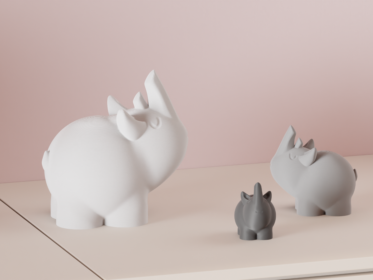 Cute Rhino Figures in white and grey displayed together