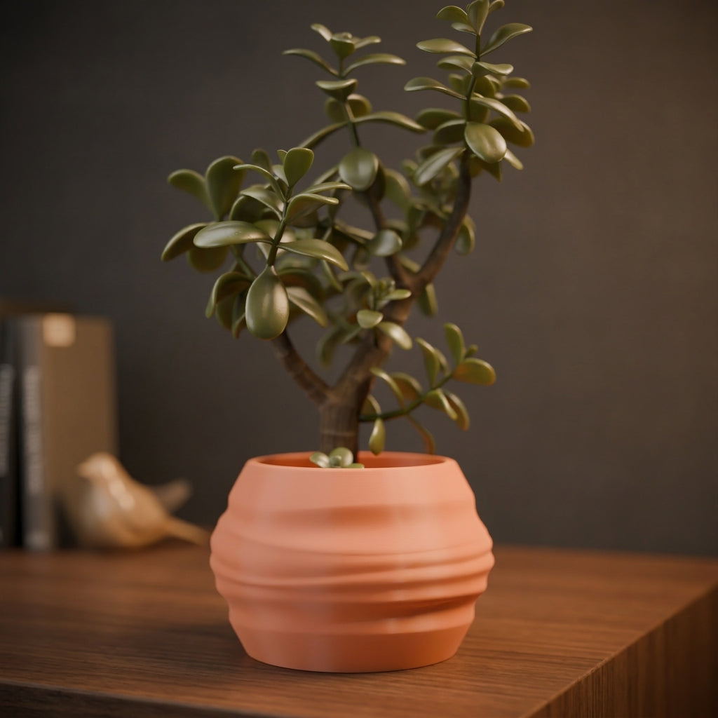 Organic Wave Planter terracotta on slate plinth with brass vase dark dramatic editorial lifestyle