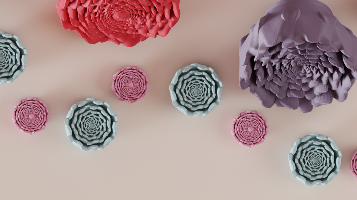 Large coral and cream spiral flower decorations