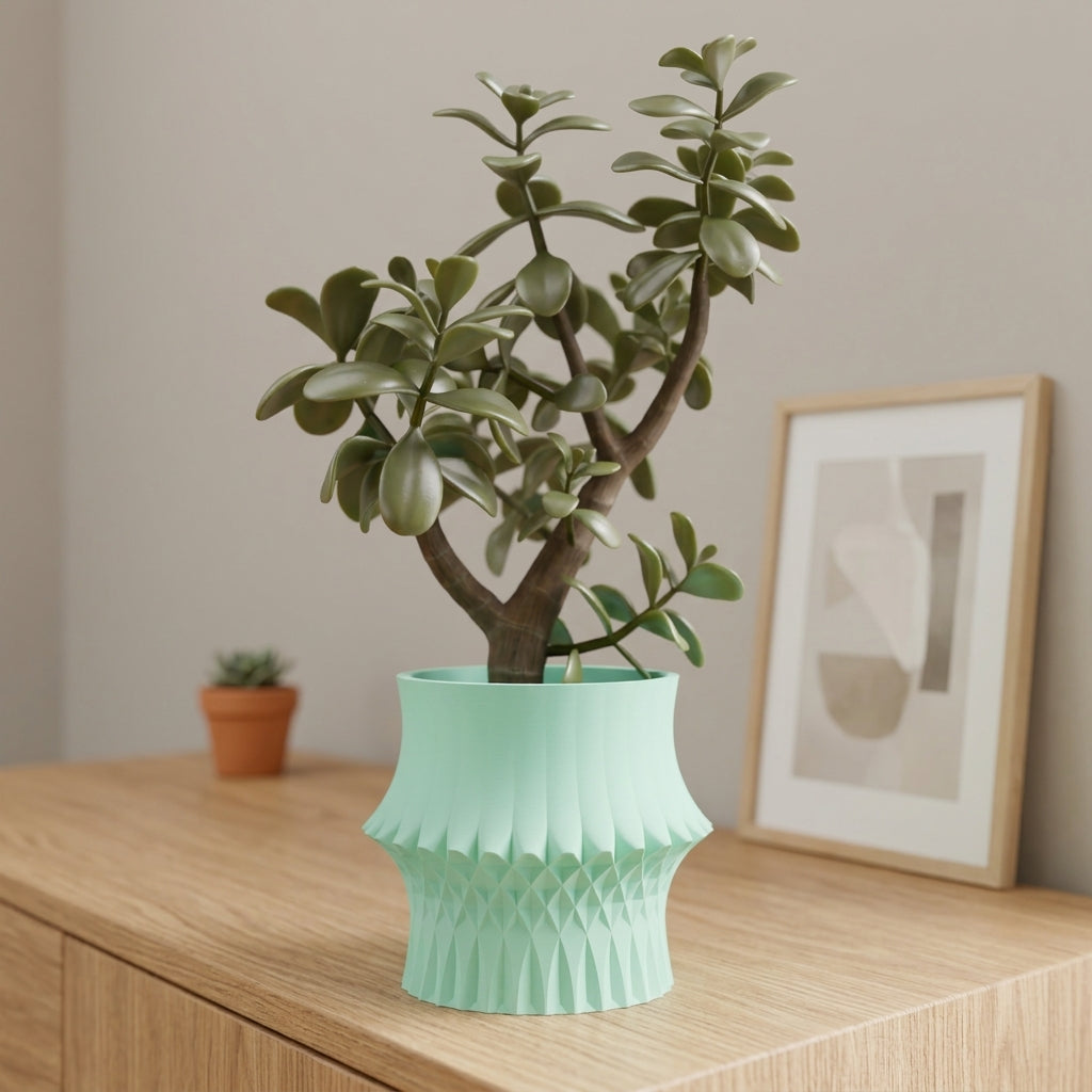 Sculpted Geometric Desk Planter mint green with jade tree on crinkled kraft paper with eucalyptus and vintage frame boho lifestyle