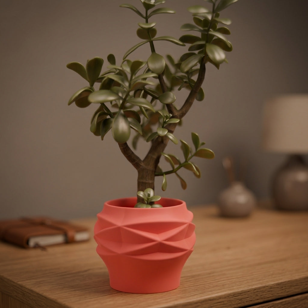 Diamond Faceted Two-Part Planter coral pink floating geometric editorial dark background with jade tree