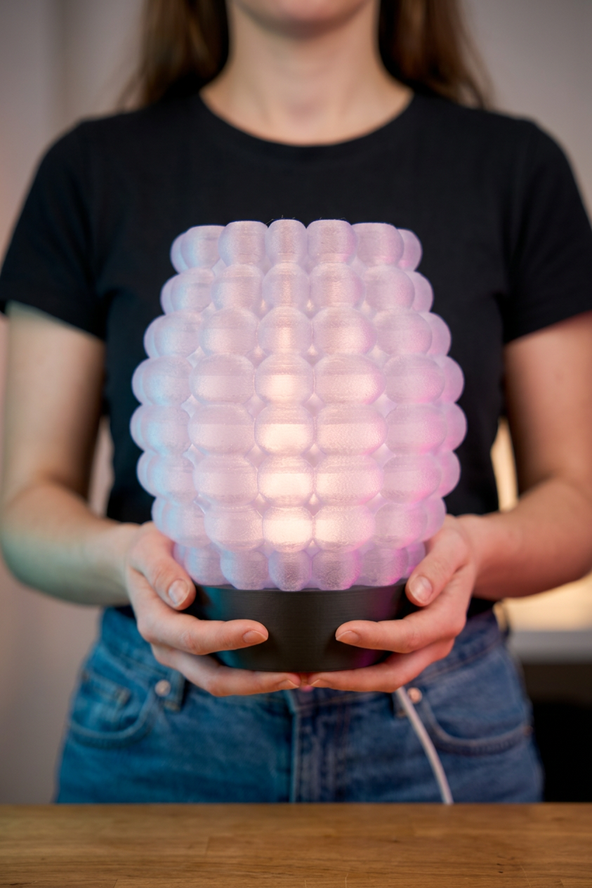 Bubble Glow Lamp white bubble texture shade black base kraft paper ceramic shards eucalyptus flatlay overhead