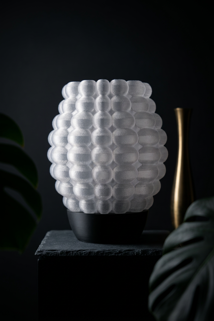 Bubble Glow Lamp white bubble texture shade black base close up texture detail dark background