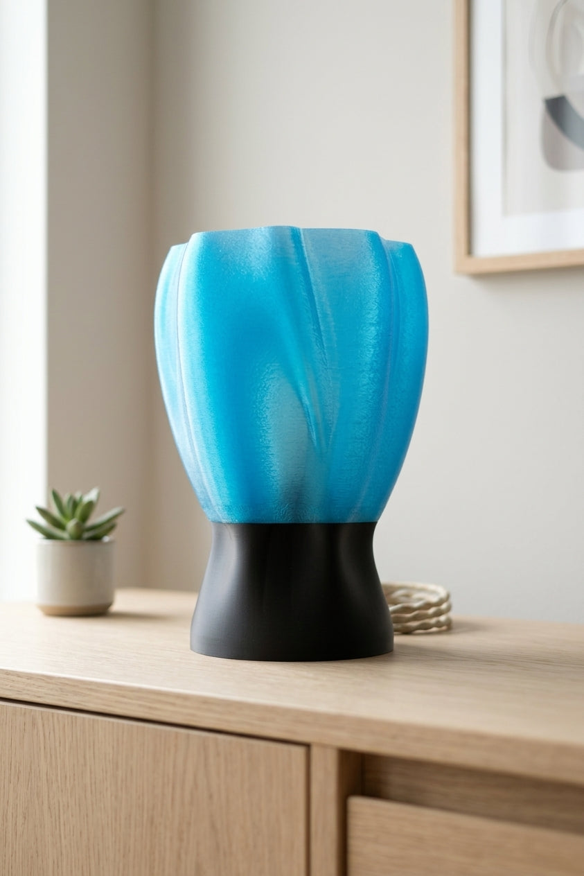 Draped organic flow lamp blue shade on oak sideboard lifestyle