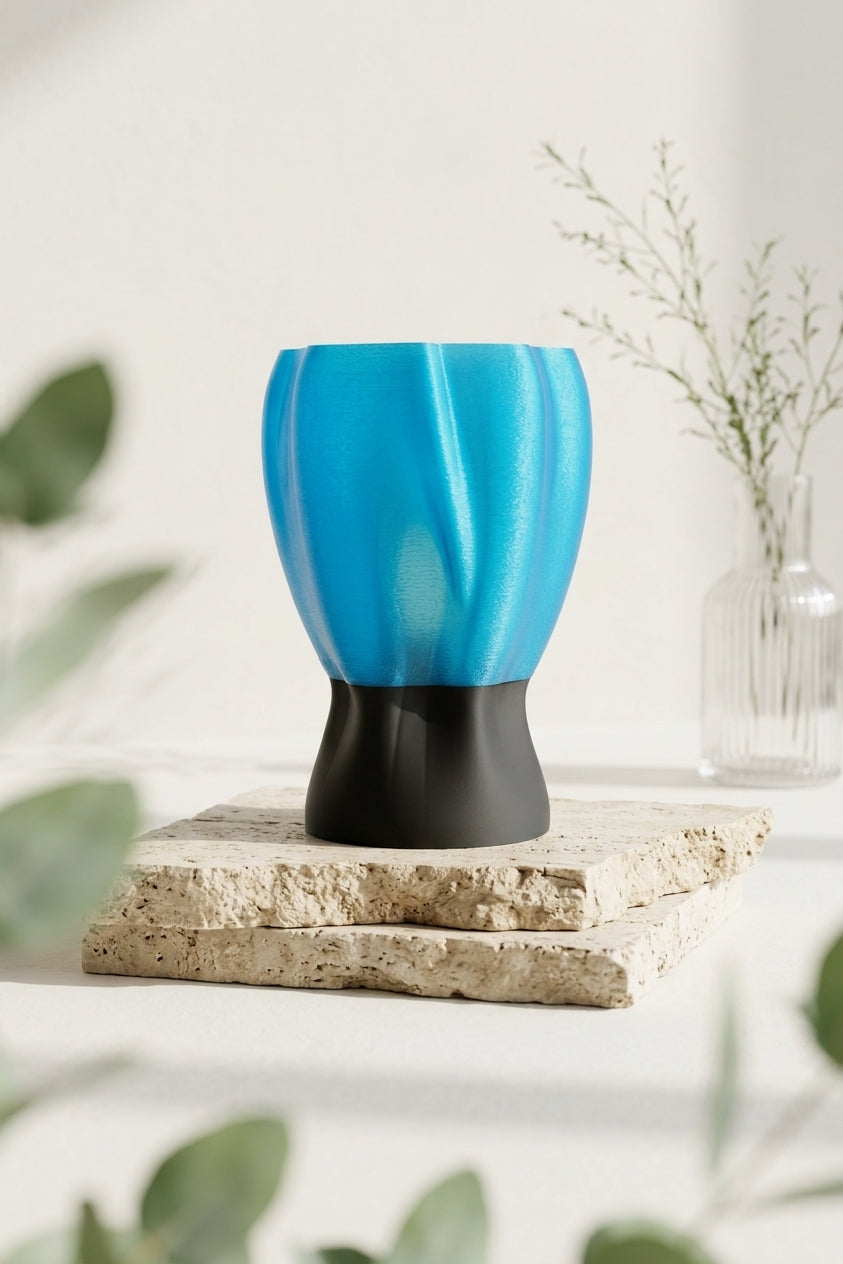 Draped organic flow lamp blue with colourful geometric shapes editorial lifestyle