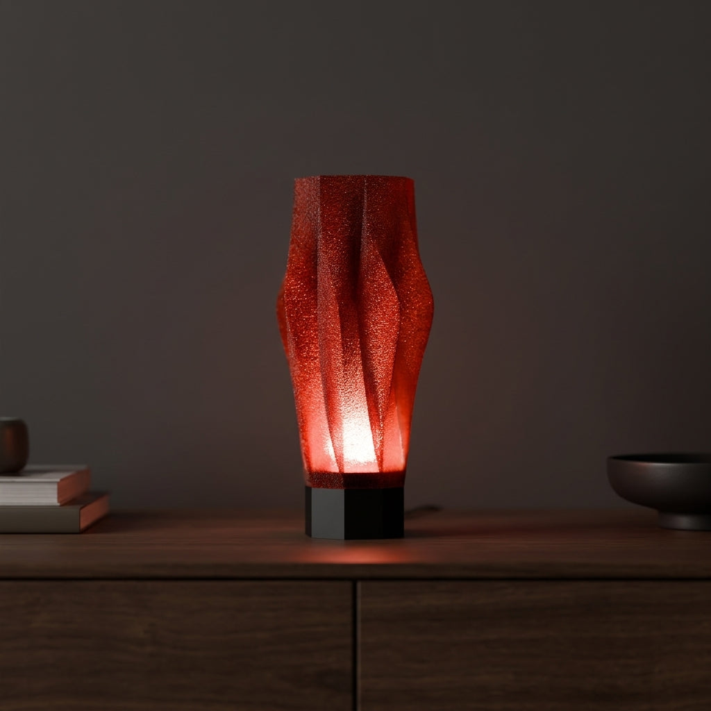 Sculptural Spiral Desk Lamp red shade black base flatlay kraft paper eucalyptus ceramic shards