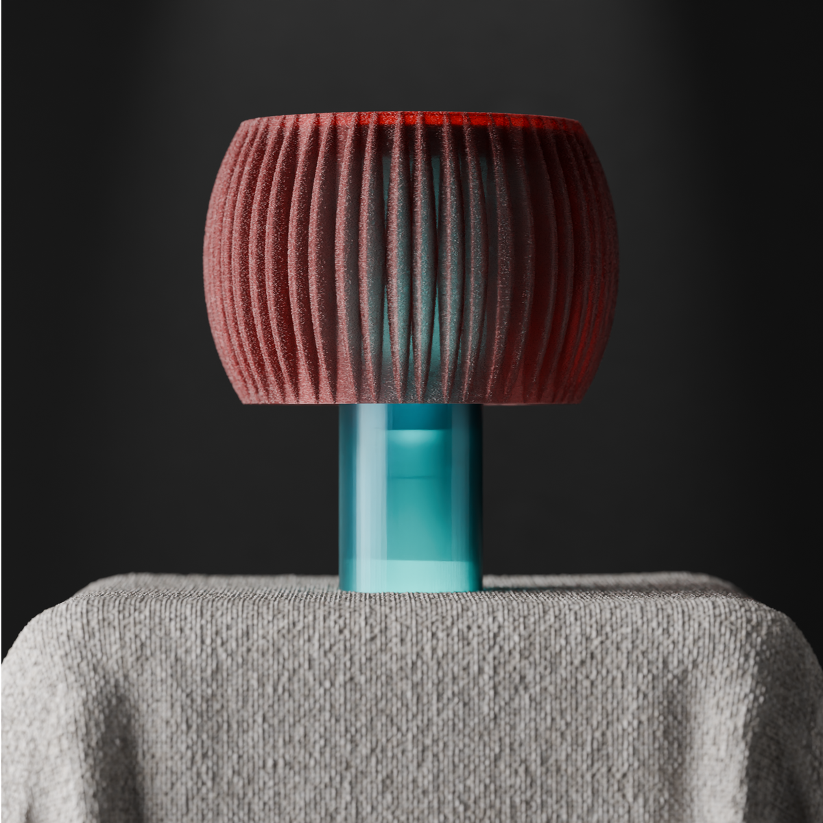 Elegant Funnel Glow Lamp pink shade teal base on linen draped plinth dark moody editorial