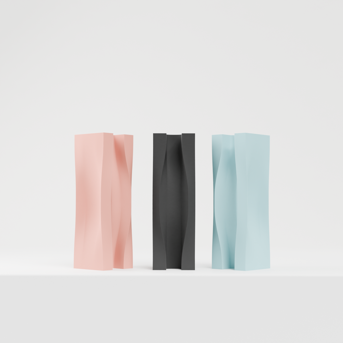 Dynamic Flowing Modern Vase pink charcoal blue trio close up depth of field view