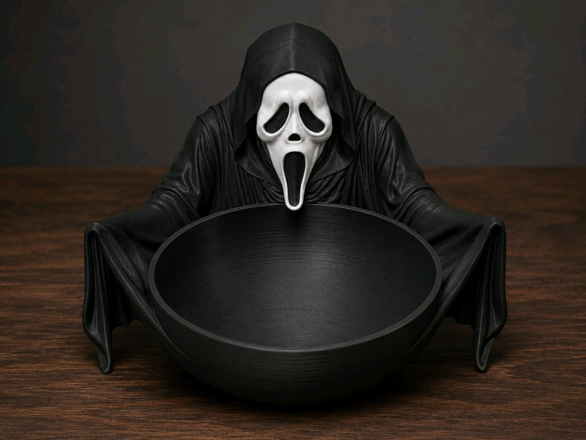Black round sweet tray held by a hooded Ghostface-inspired figure with white mask