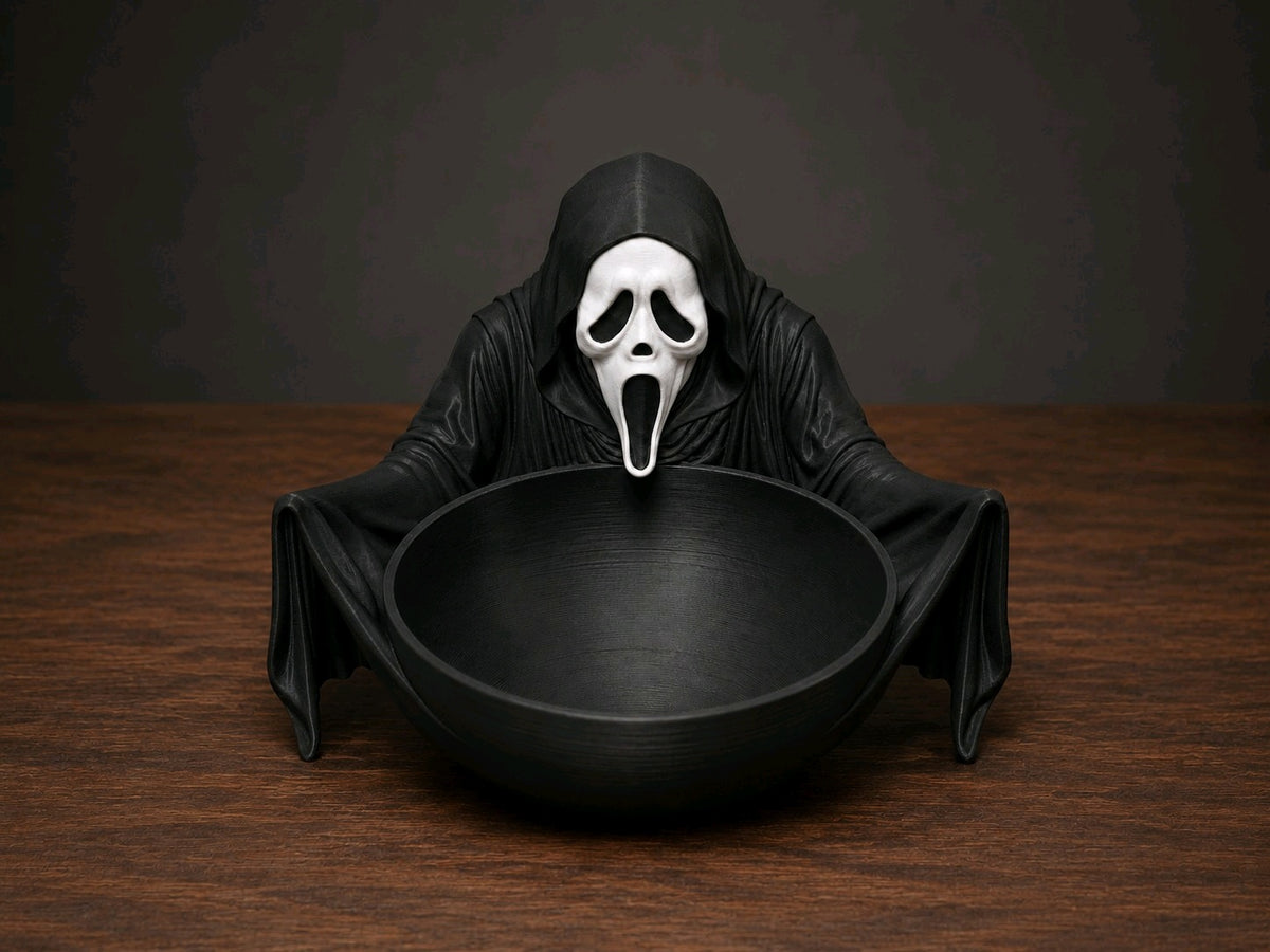 Closer view of the hooded Ghostface-inspired sweet tray with open black bowl