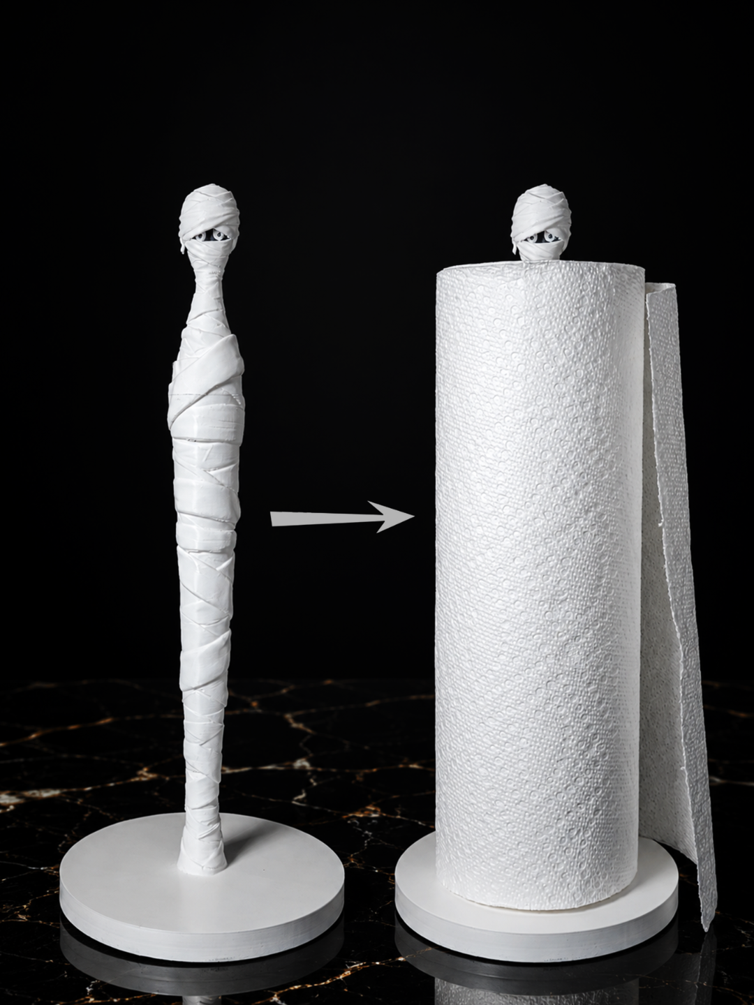 White mummy kitchen towel holder with a kitchen roll around its wrapped body