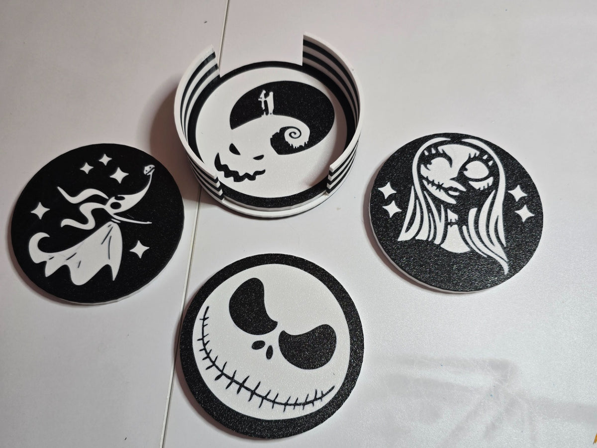 Four black-and-white Nightmare Before Christmas-inspired character coasters