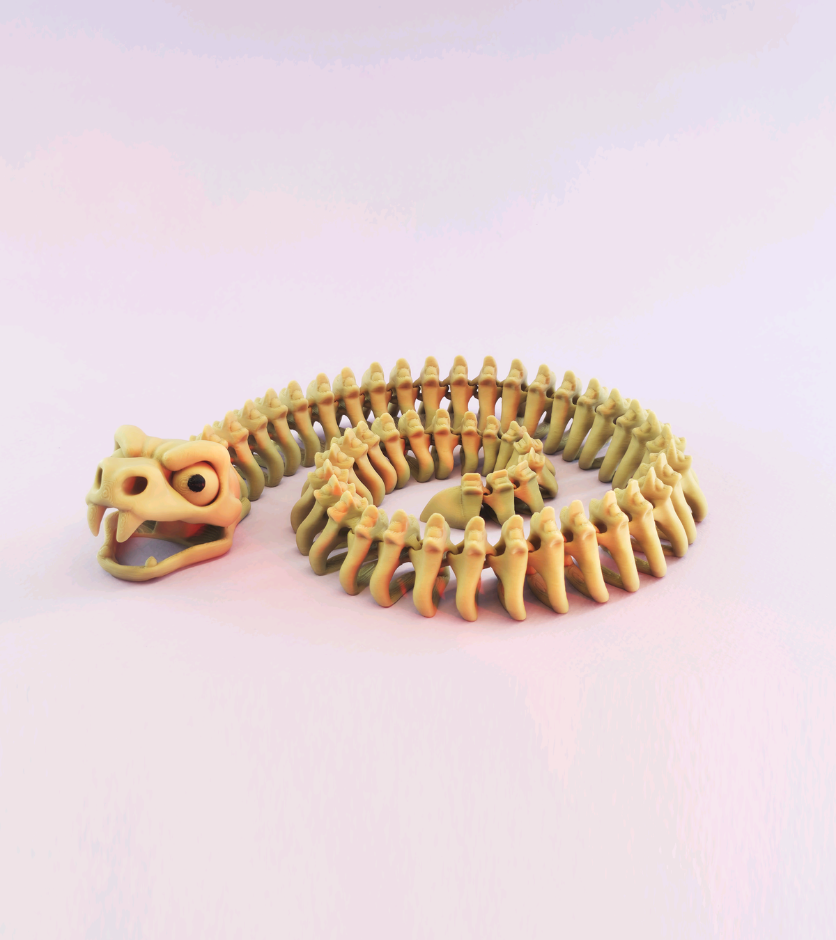 Bone-coloured snake skeleton fidget arranged in a compact coil