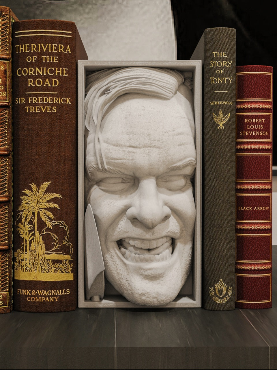Unpainted The Shining horror face book nook displayed between books