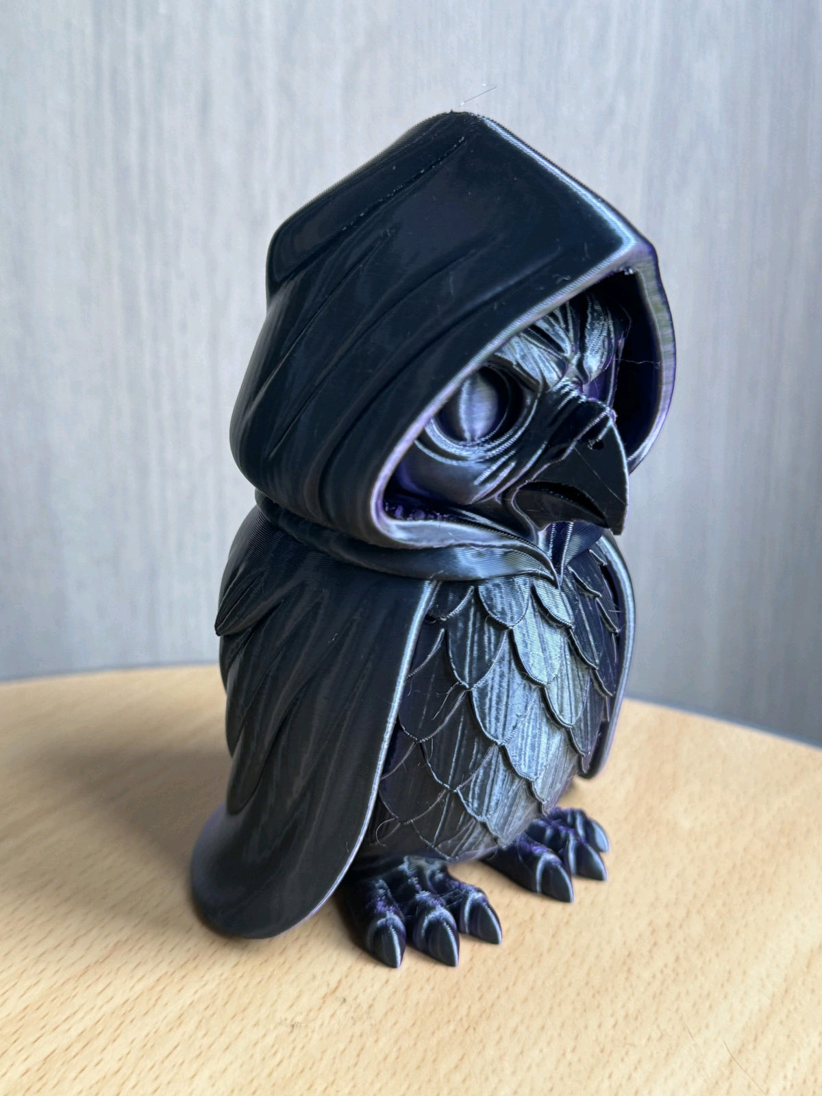 Cloaked Owl decorative sculpture side view