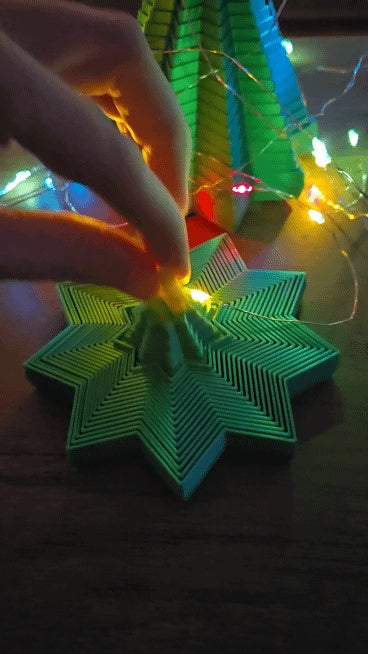 Close view of the ridged star-shaped fidget spinner with yellow centre star