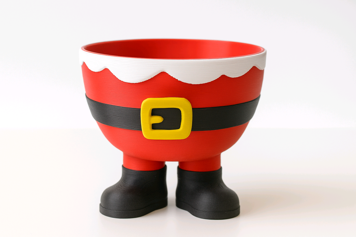 Red Santa legs sweet bowl with gold buckle and black boots, styled with cookies