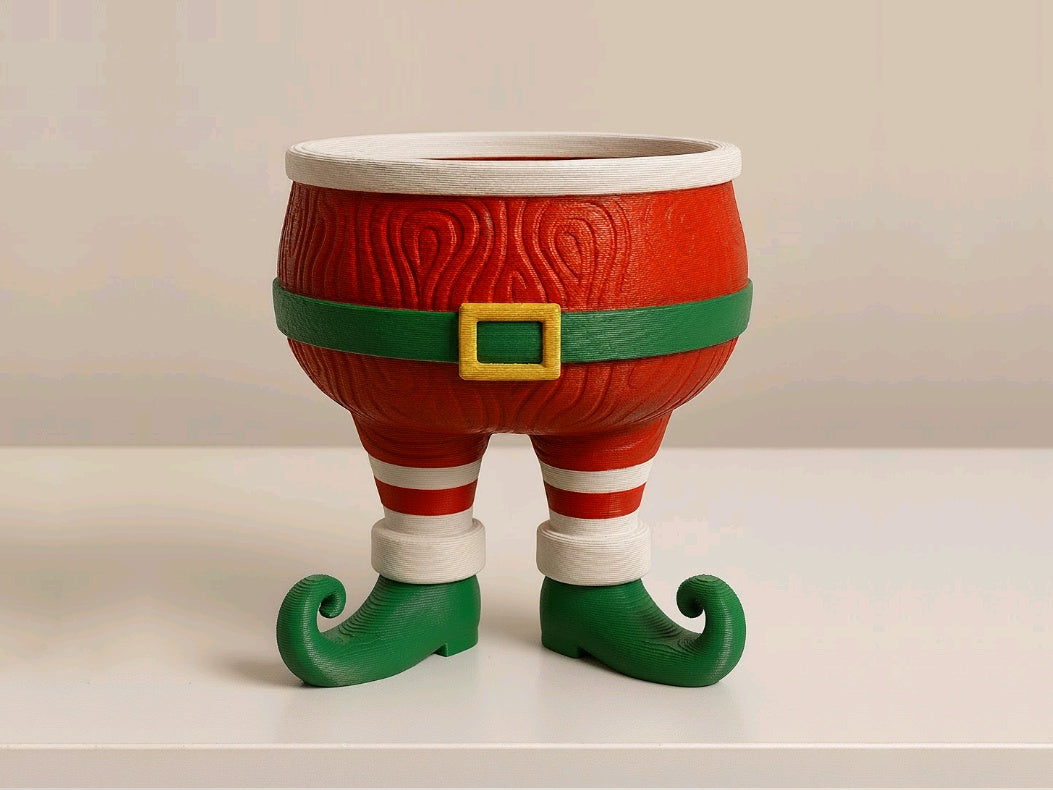 Full view of the red Santa sweet bowl with striped legs and green elf shoes