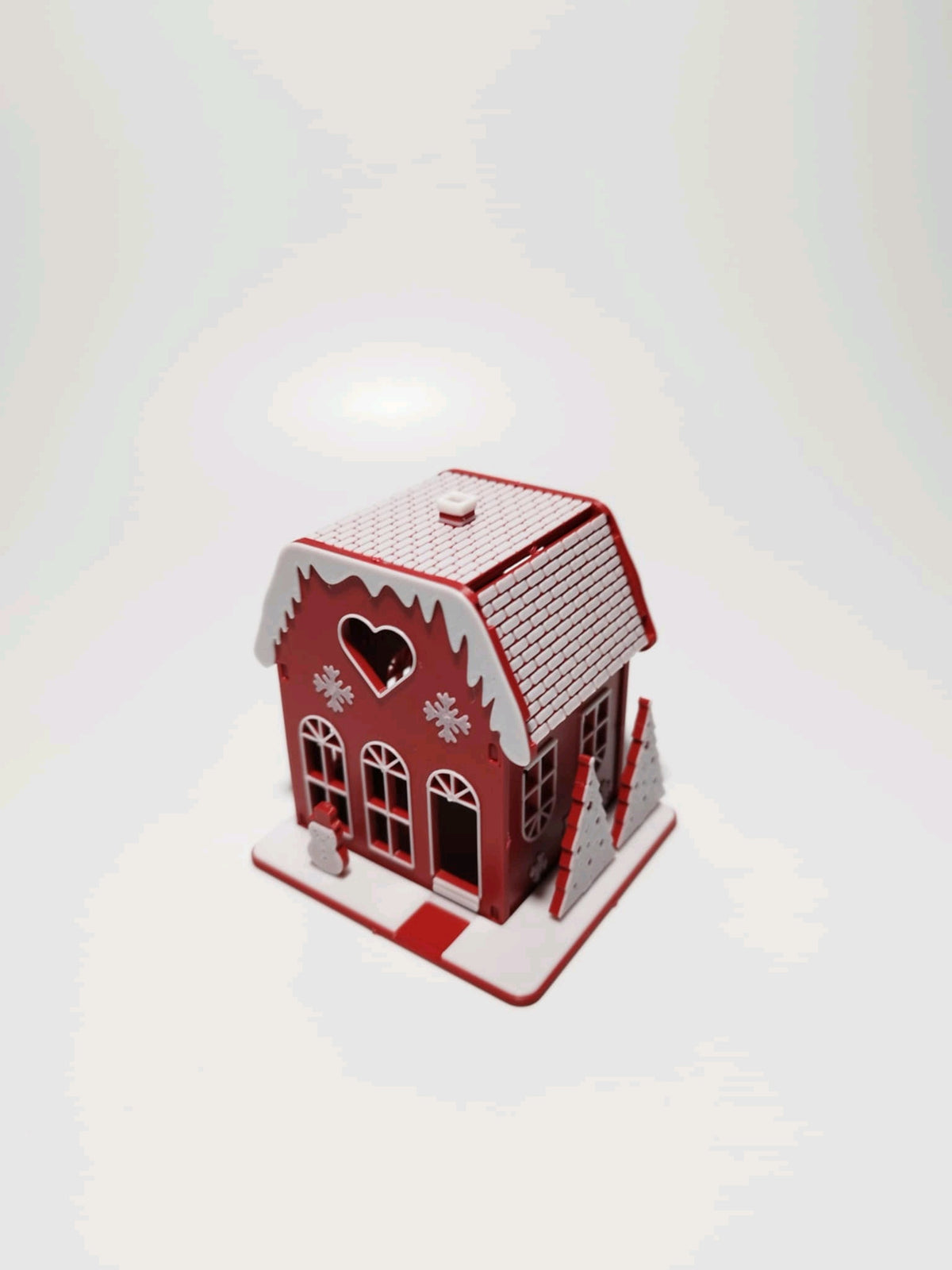 Four colour options for the miniature Christmas house model