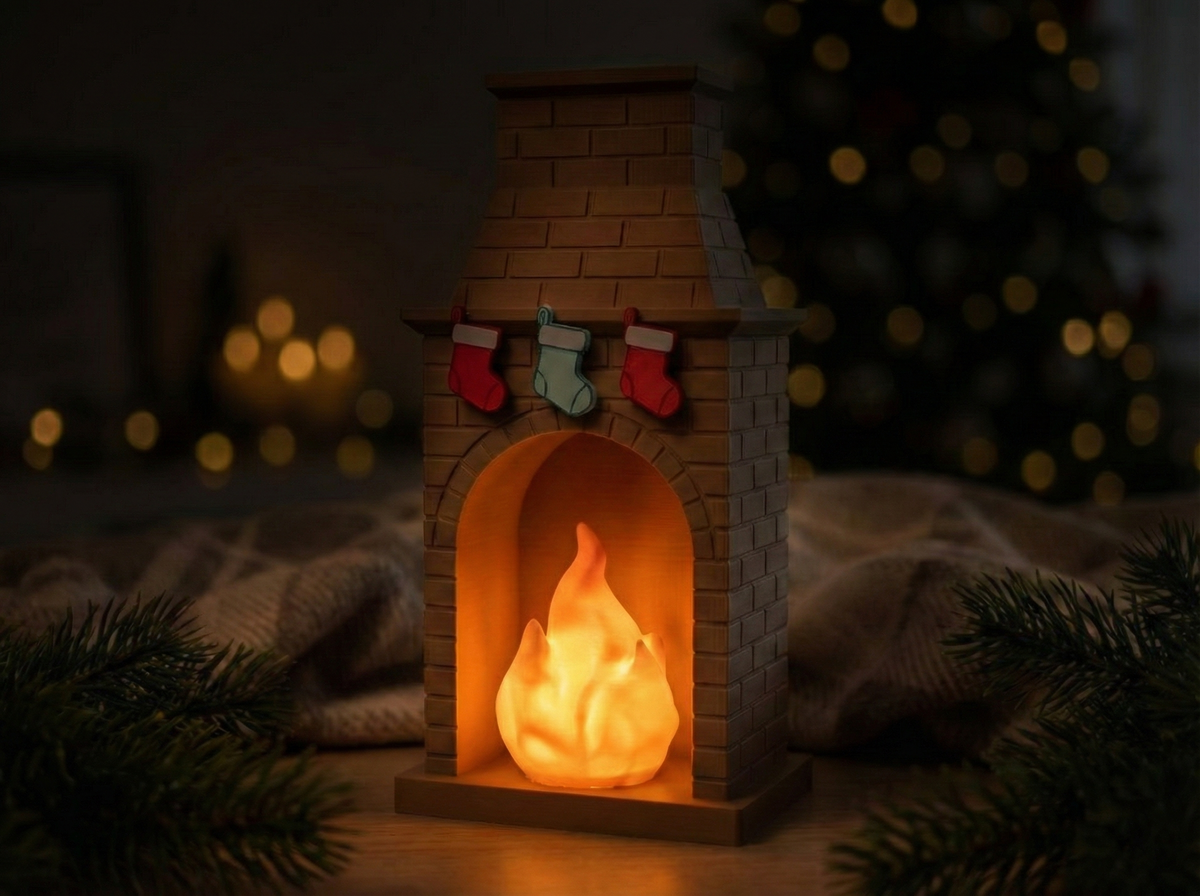 Festive miniature fireplace tealight holder styled with warm lights