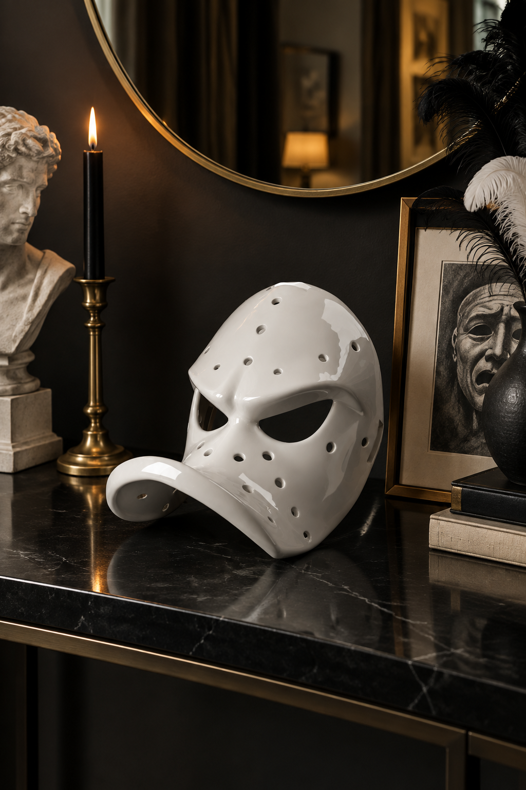 White perforated Duck Bill Mask on a black console beneath a round mirror