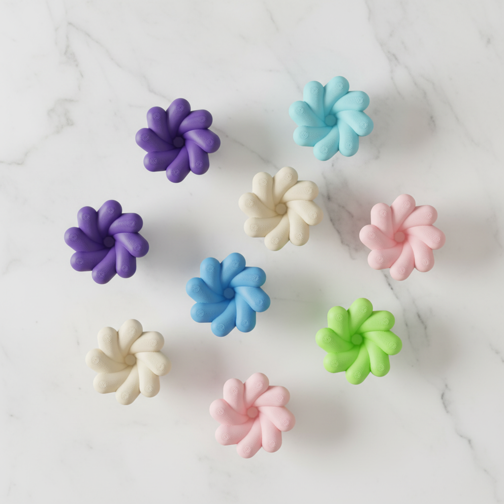 Multi-colour twisted knobs flat lay on white marble - lifestyle