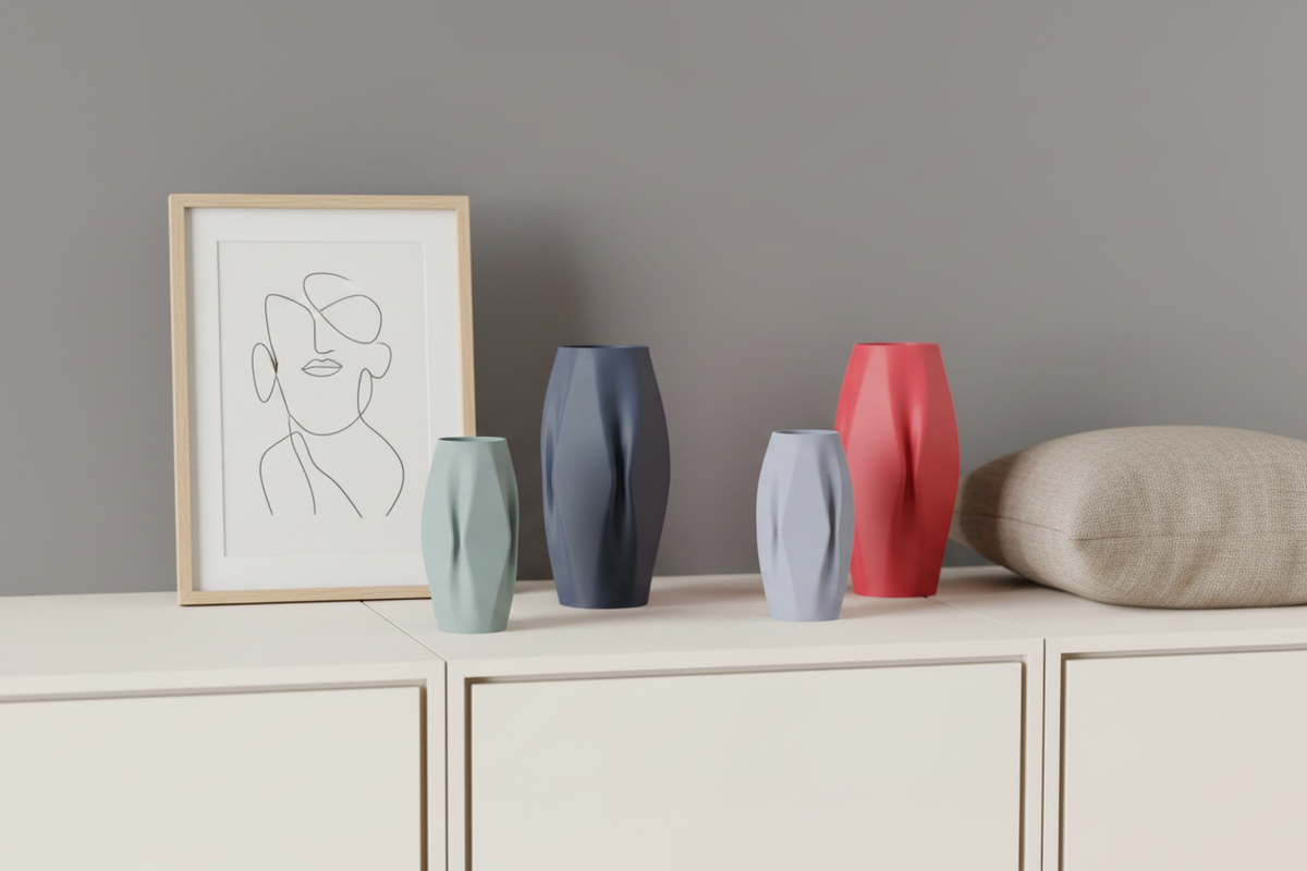Group of three quad ripple vases in sage green slate and pink on cream sideboard Scandinavian shelfie lifestyle