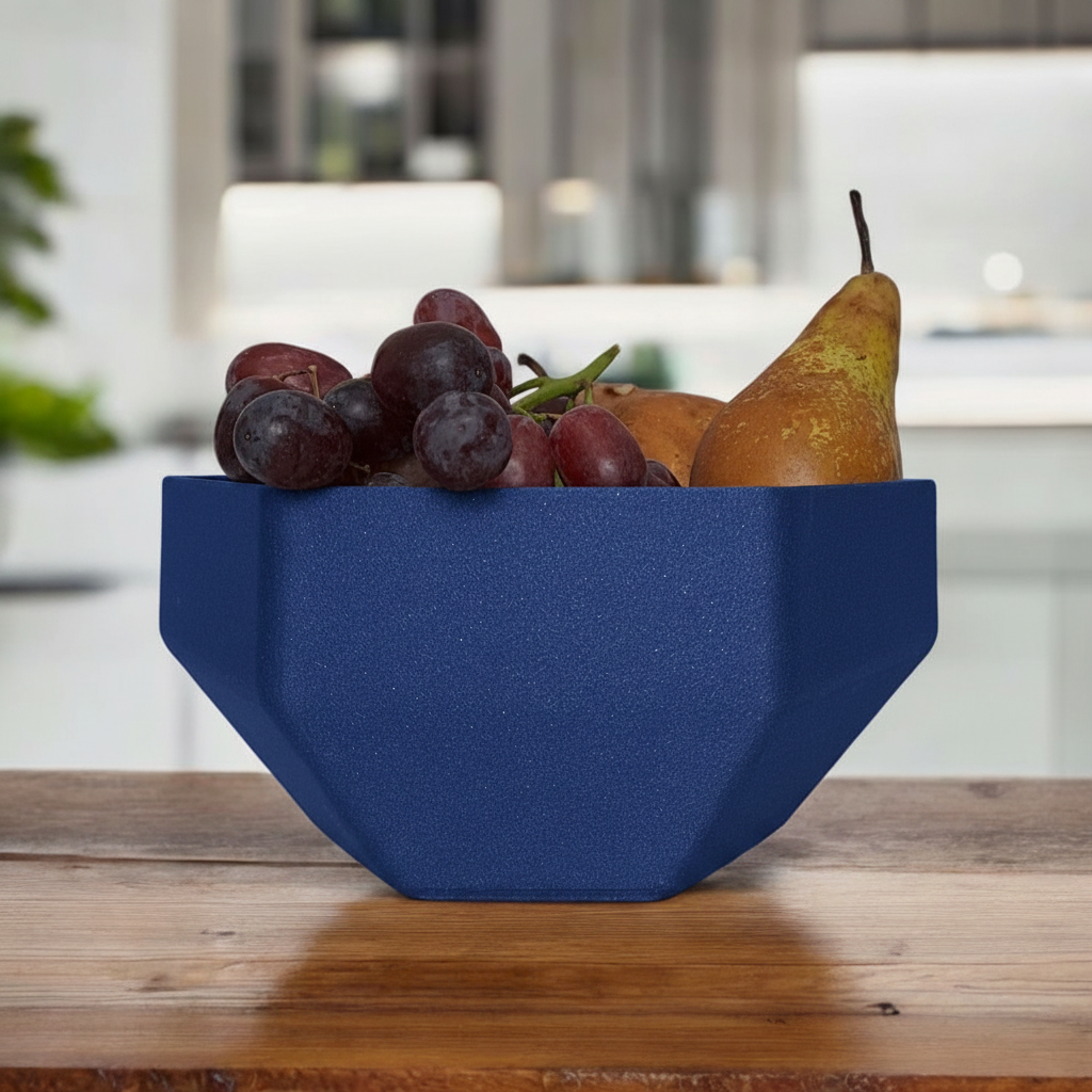 Deep blue Minimalist Hexagonal Bowl with grapes and a pear on a wooden kitchen counter