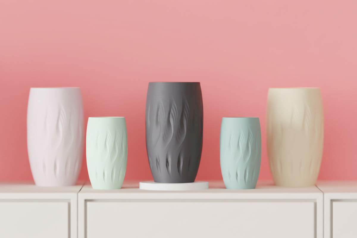 Five Stagger Twist Vases soft pink white sage green slate grey warm beige matte flowing flame-twist surface impressions varying heights pale cream sideboard blush pink wall soft diffuse interior light wide editorial landscape
