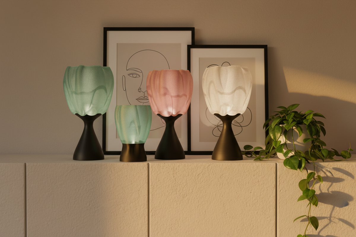 Group of three draped organic lamps glowing in sage green pink and white on cream sideboard shelfie lifestyle
