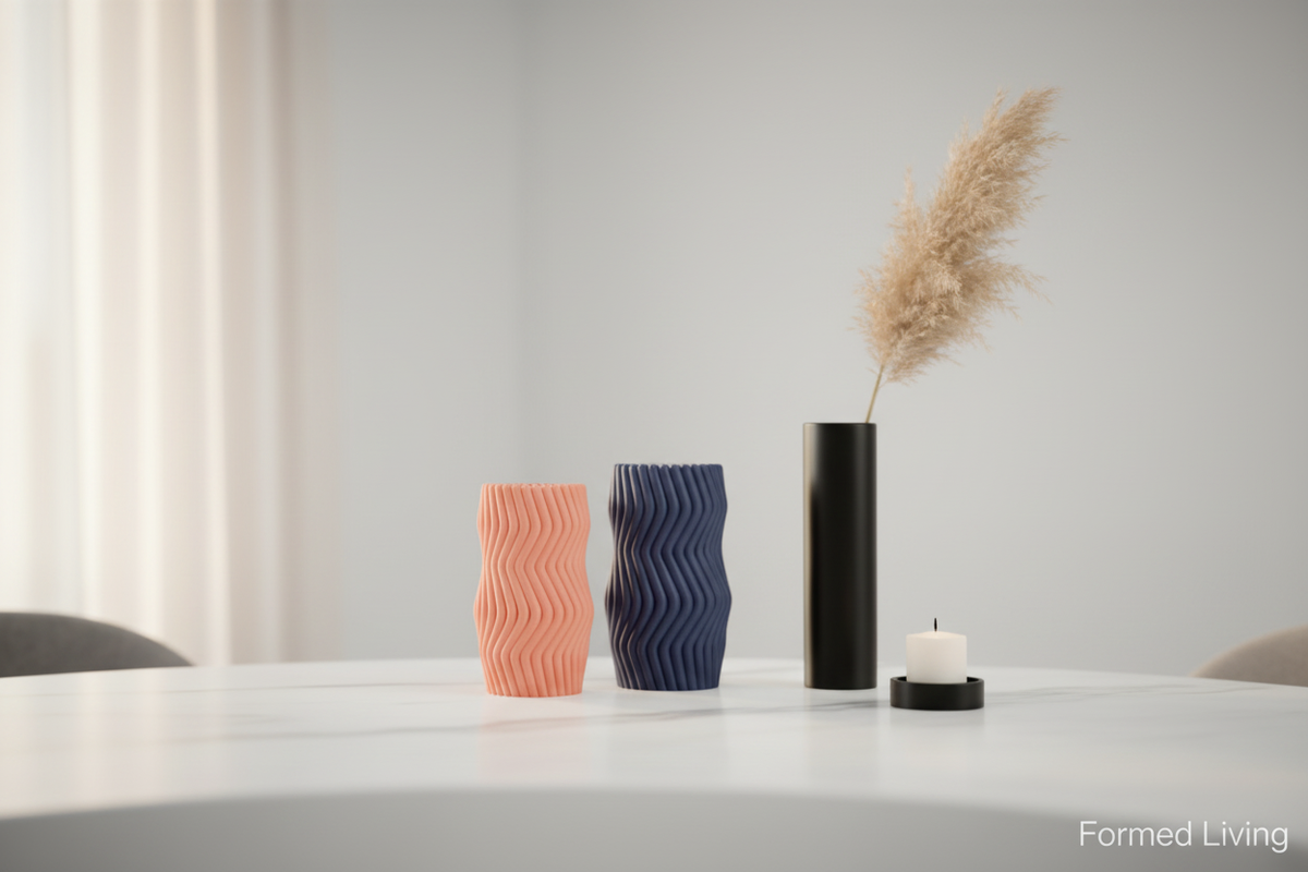 Wavy Twist Vase Set in orange, marble table, warm light