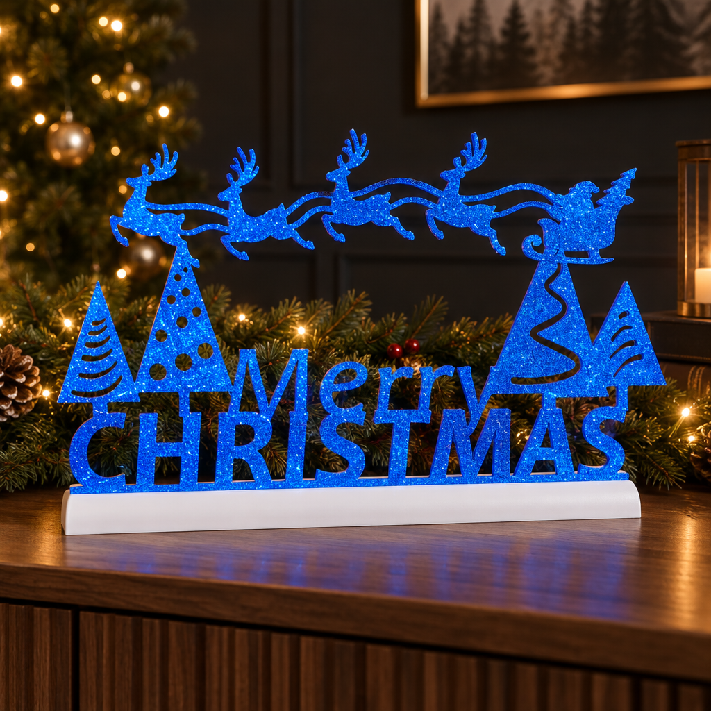 Neon glitter blue Merry Christmas sign on a fixed white base with warm Christmas lights