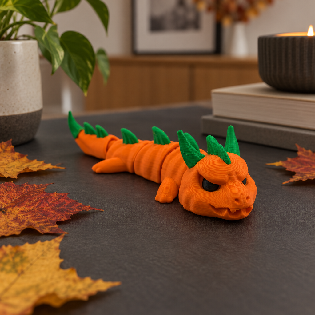 Pumpkin dragon on a charcoal tabletop